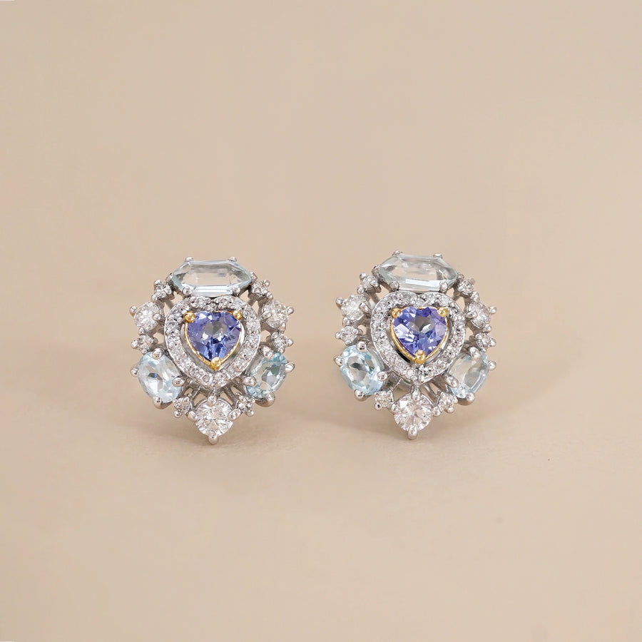Amalfi Sky Studs with heart-shaped tanzanite surrounded by brilliant diamonds and blue topaz.