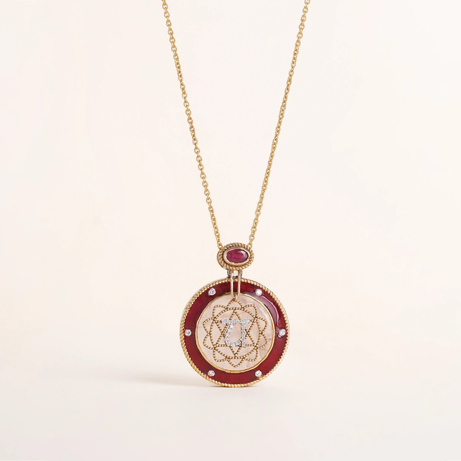 Anah Rose Pendant Necklace in 14K gold featuring rose quartz, diamond Anahata motif and red enamel.
