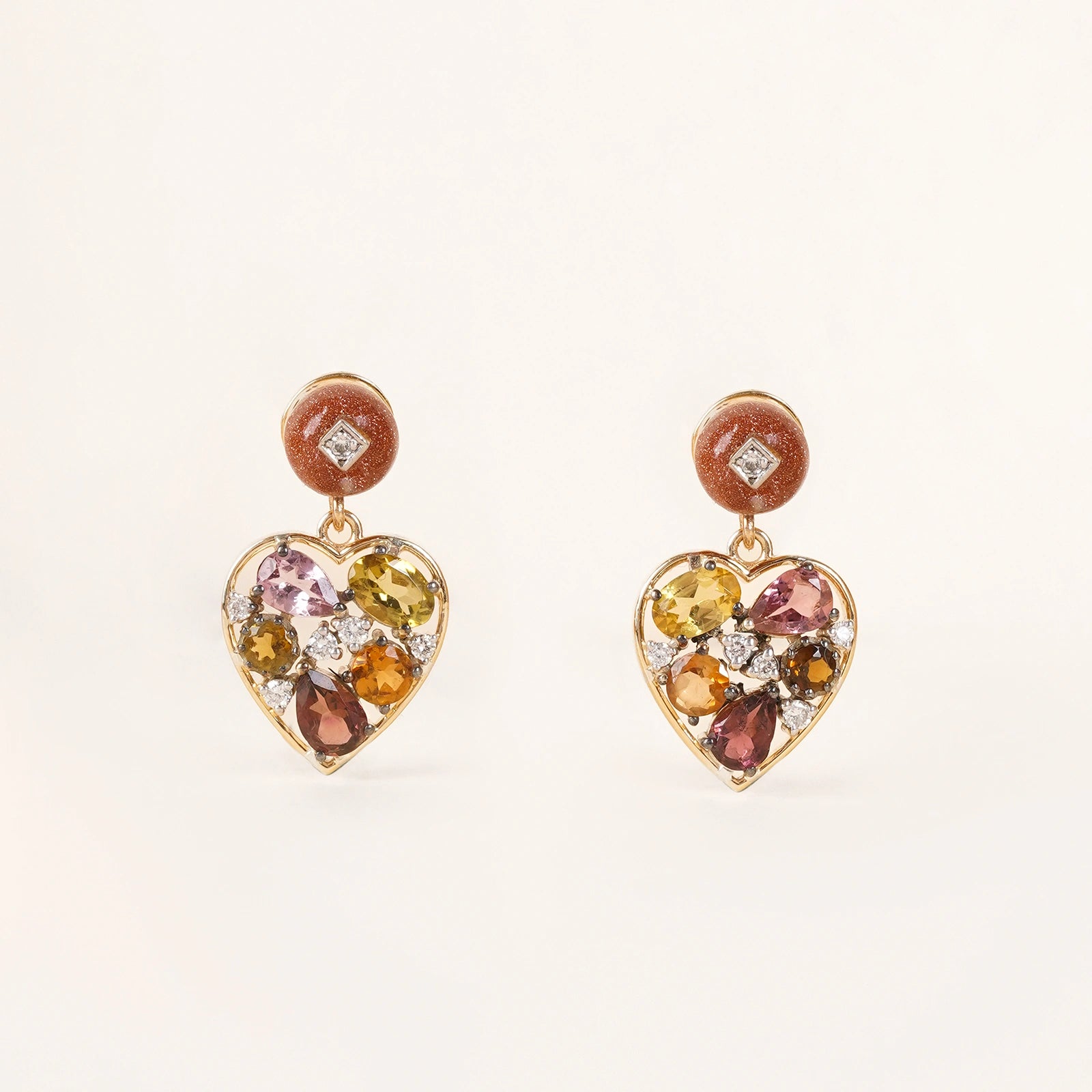 Bae Earrings in 14K gold with sunstone studs, multi-tourmaline heart drops and natural diamond accents.