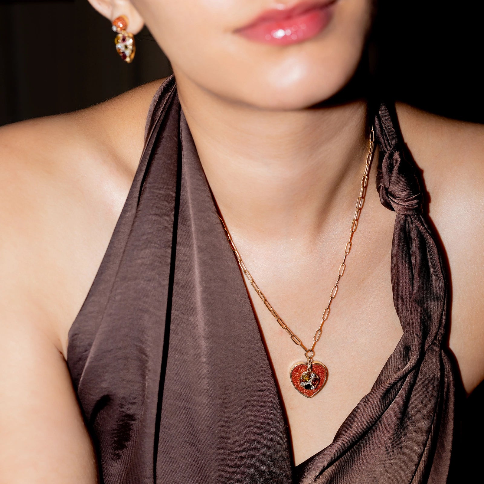 Belov Necklace in 14K gold with heart-shaped sunstone, tourmaline accents and natural diamond detailing.