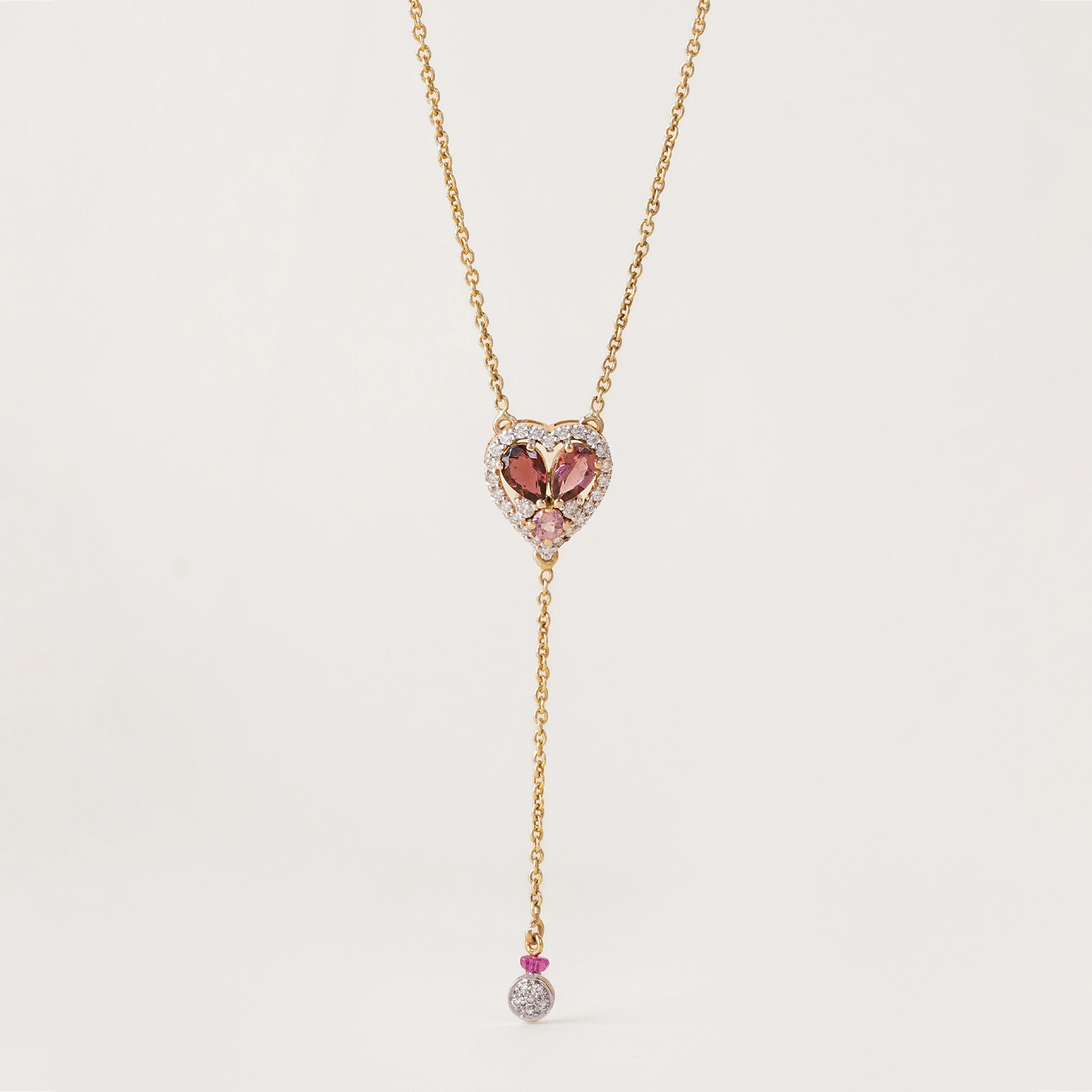 Cherie Necklace featuring heart-shaped diamond frame and pink tourmaline.