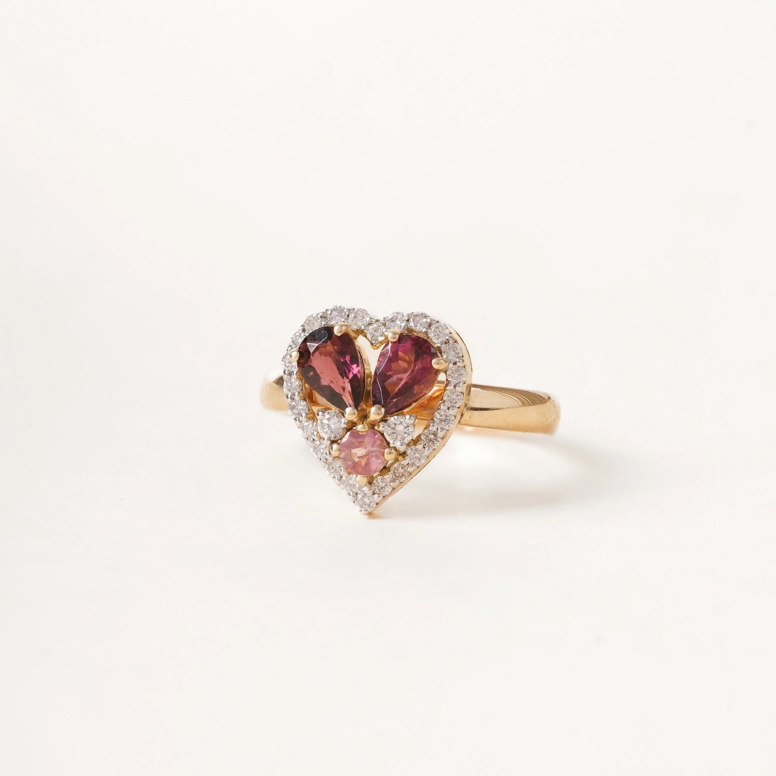 Cherie Ring in 14K gold with heart-shaped pink tourmaline and natural diamond halo.