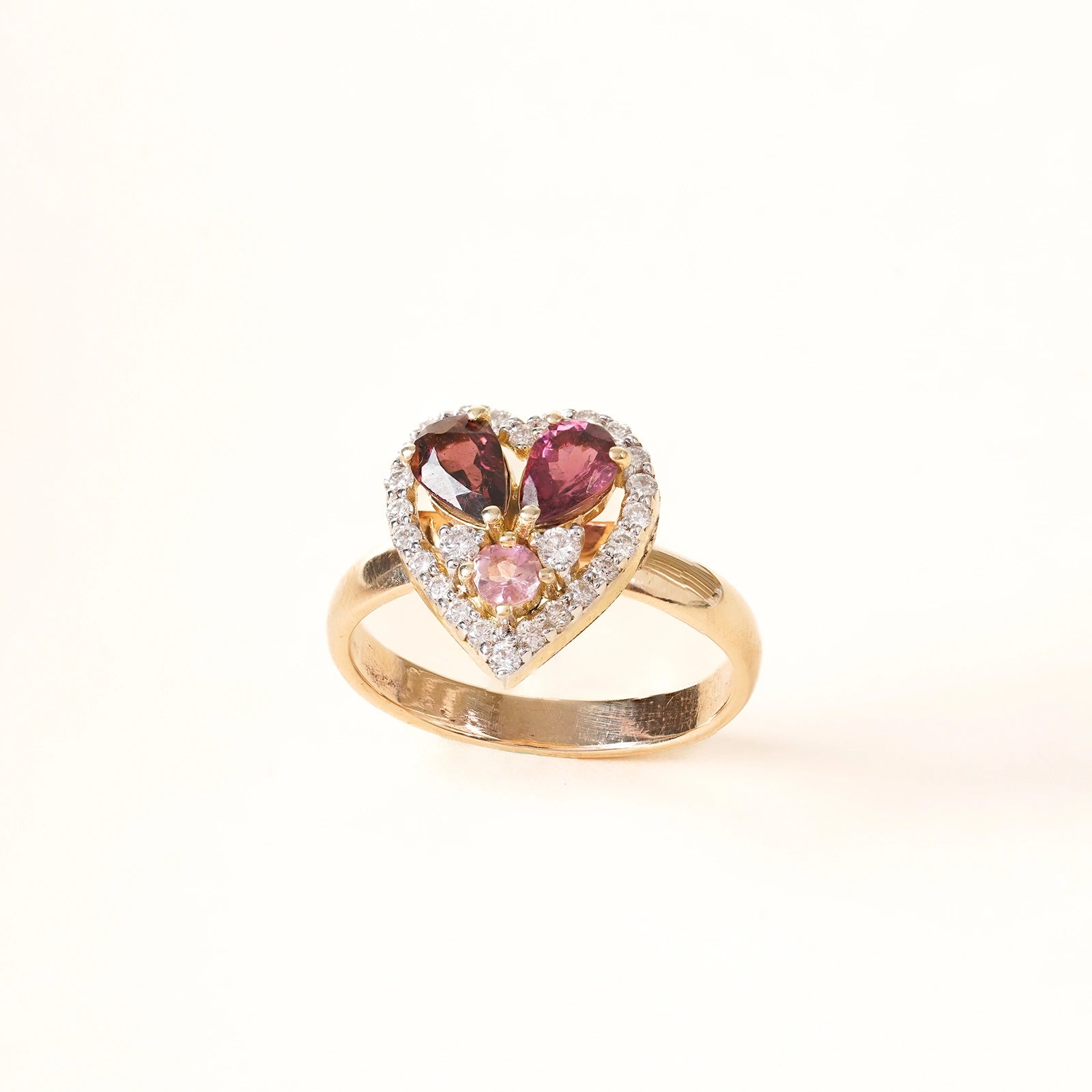 Cherie Ring in 14K gold with heart-shaped pink tourmaline and natural diamond halo.