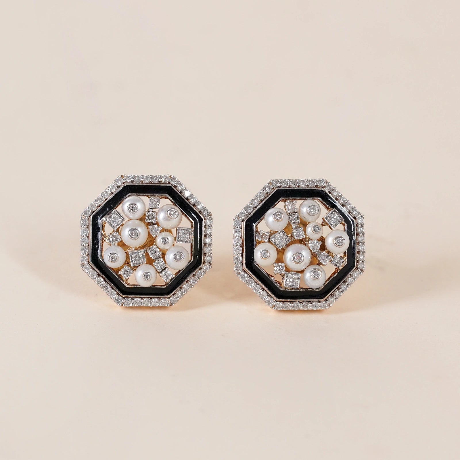 Cleo Snow Ear Studs in 14K gold and 925 silver with clustered cultured pearls, natural brilliant-cut diamonds and black enamel