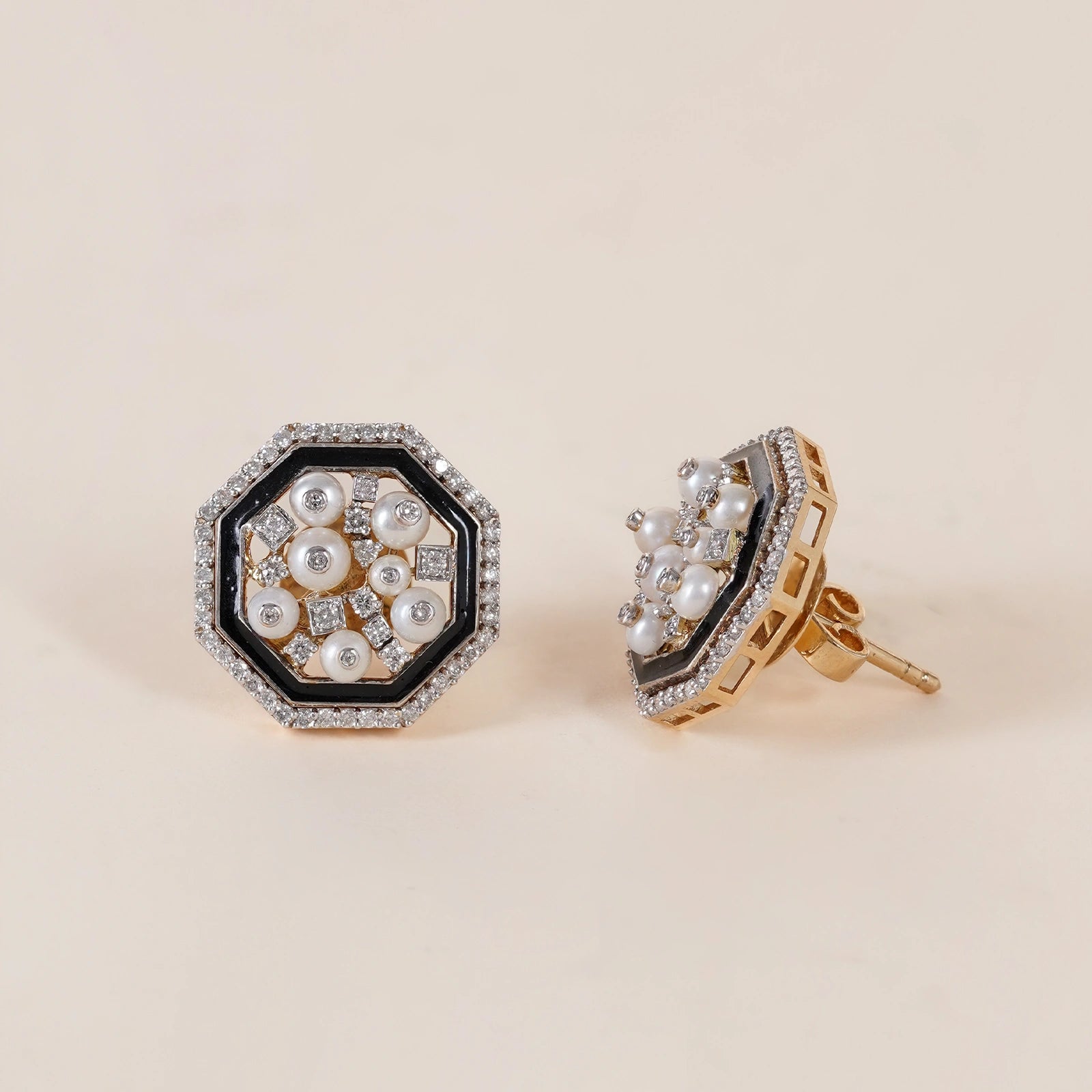 Cleo Snow Ear Studs in 14K gold and 925 silver with clustered cultured pearls, natural brilliant-cut diamonds and black enamel