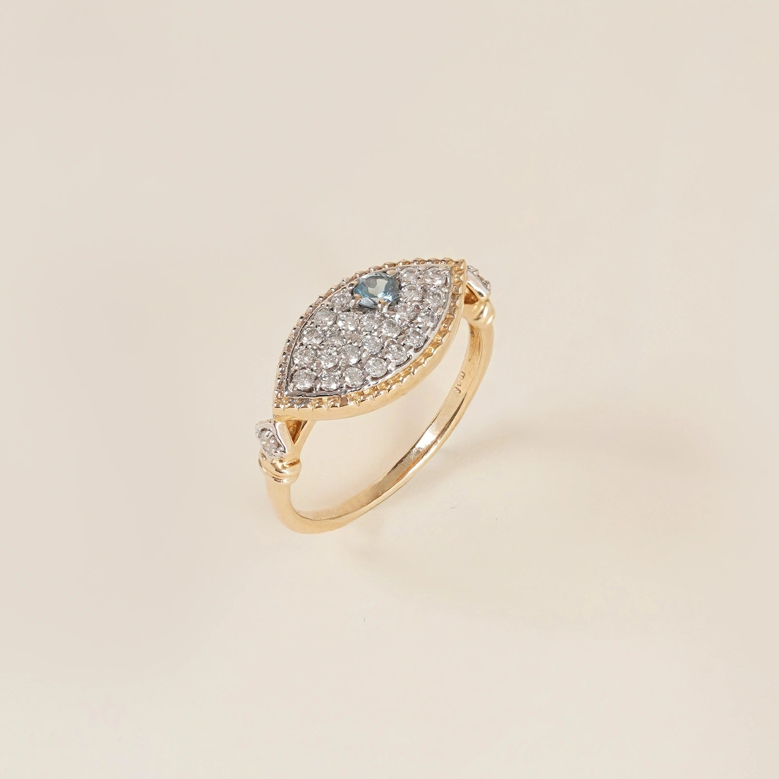 Evil Eye Ring in 14K gold with blue topaz evil eye and natural brilliant-cut diamonds