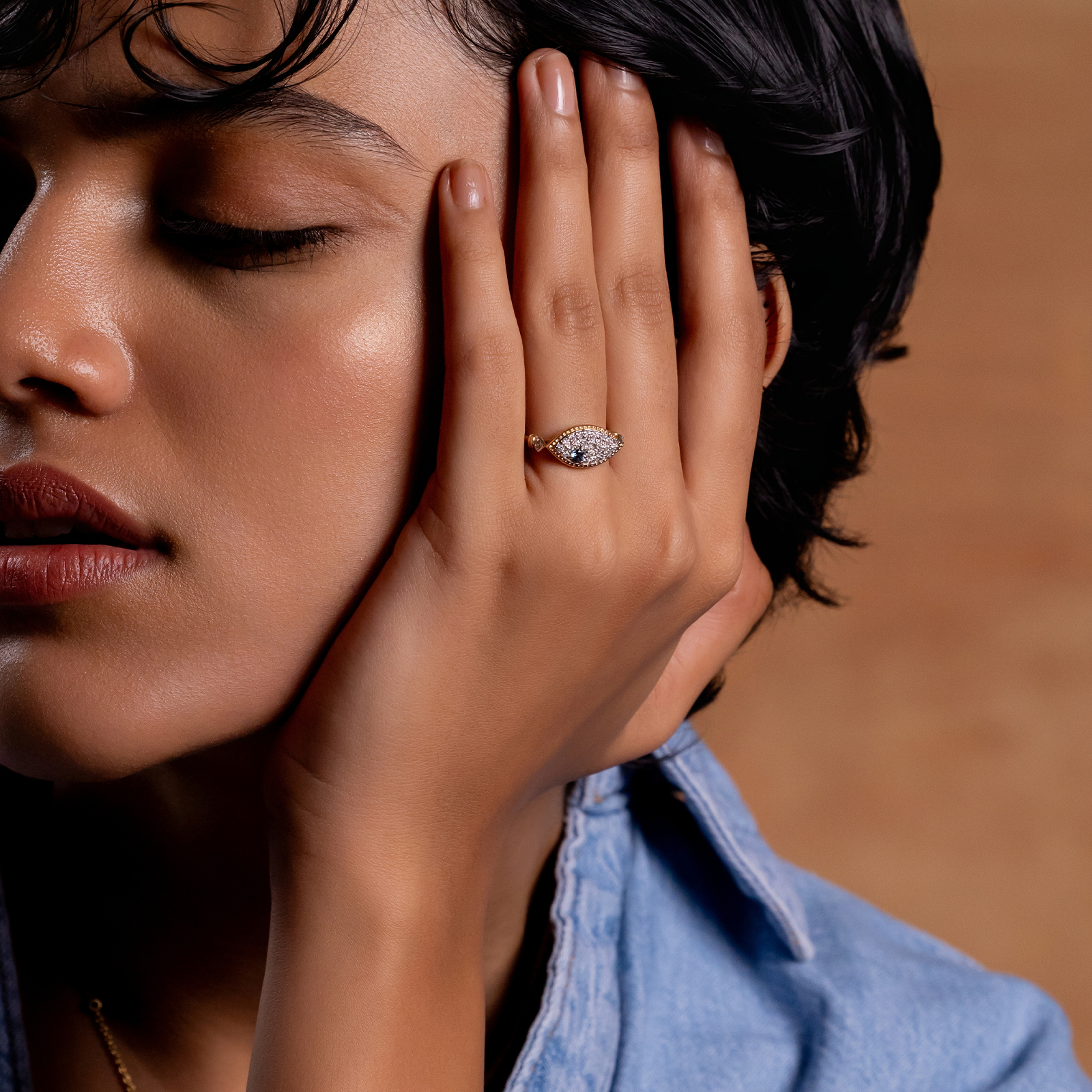 Evil Eye Ring in 14K gold with blue topaz evil eye and natural brilliant-cut diamonds