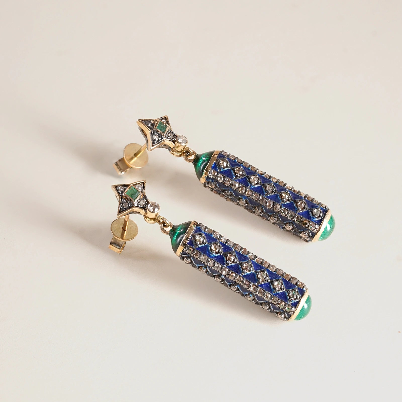 Fira Earrings in gold and 925 silver with cabochon emeralds, natural rose-cut and brilliant-cut diamonds, and blue and green enamel