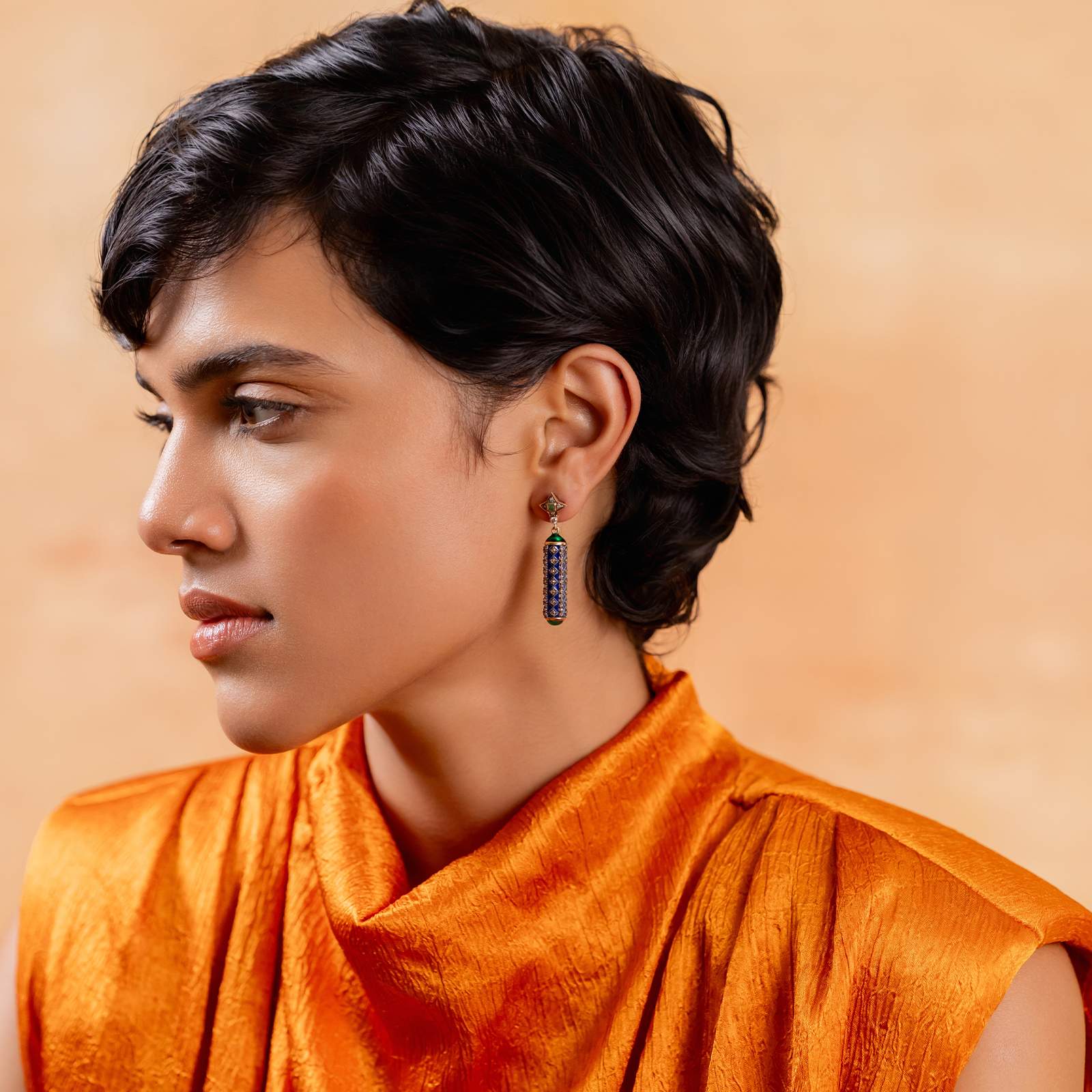 Fira Earrings in gold and 925 silver with cabochon emeralds, natural rose-cut and brilliant-cut diamonds, and blue and green enamel