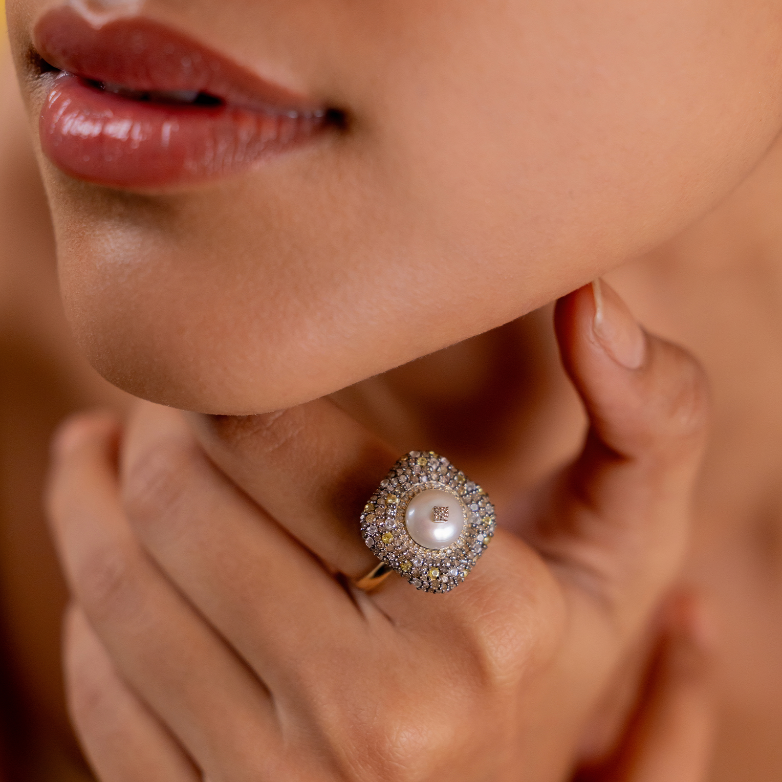 Gwen Ring in 14K gold and 925 silver with cultured pearl centre, natural rose-cut diamonds, sapphires and black enamel