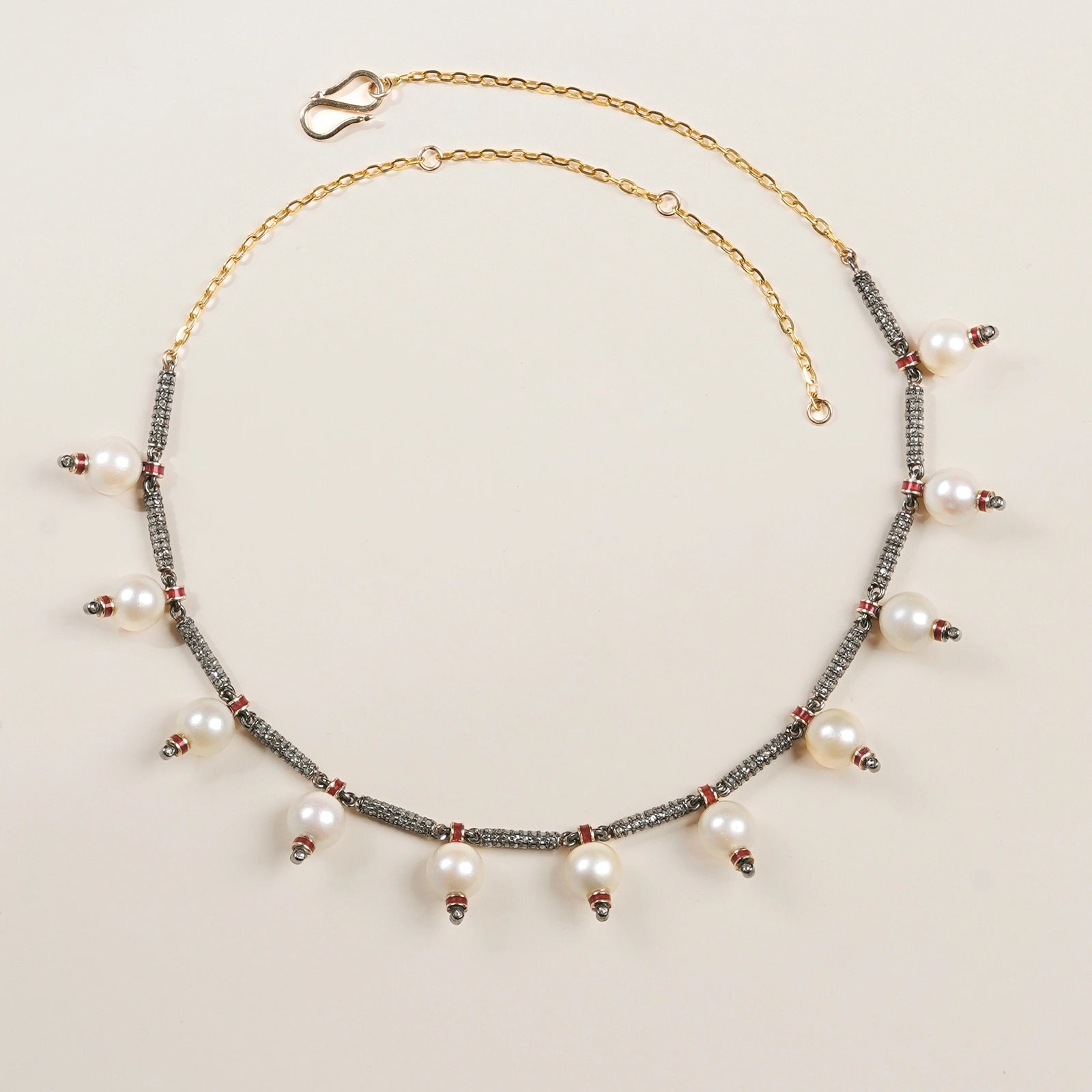 Jennie Snow Necklace with cultured pearls and natural rose-cut diamonds strung with intermittent red enamel details