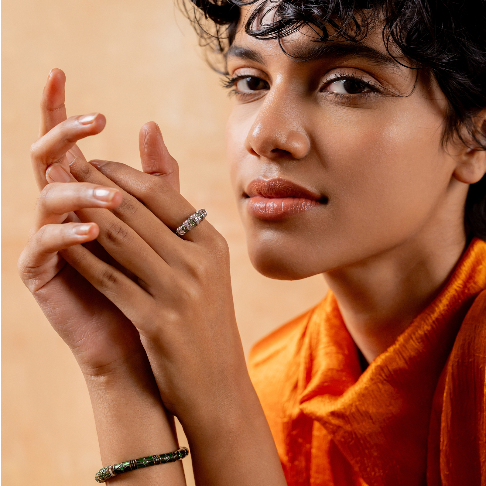 Paris Tsavorite Ring in 14K gold with alternating natural baguette diamonds and tsavorite in an architectural band