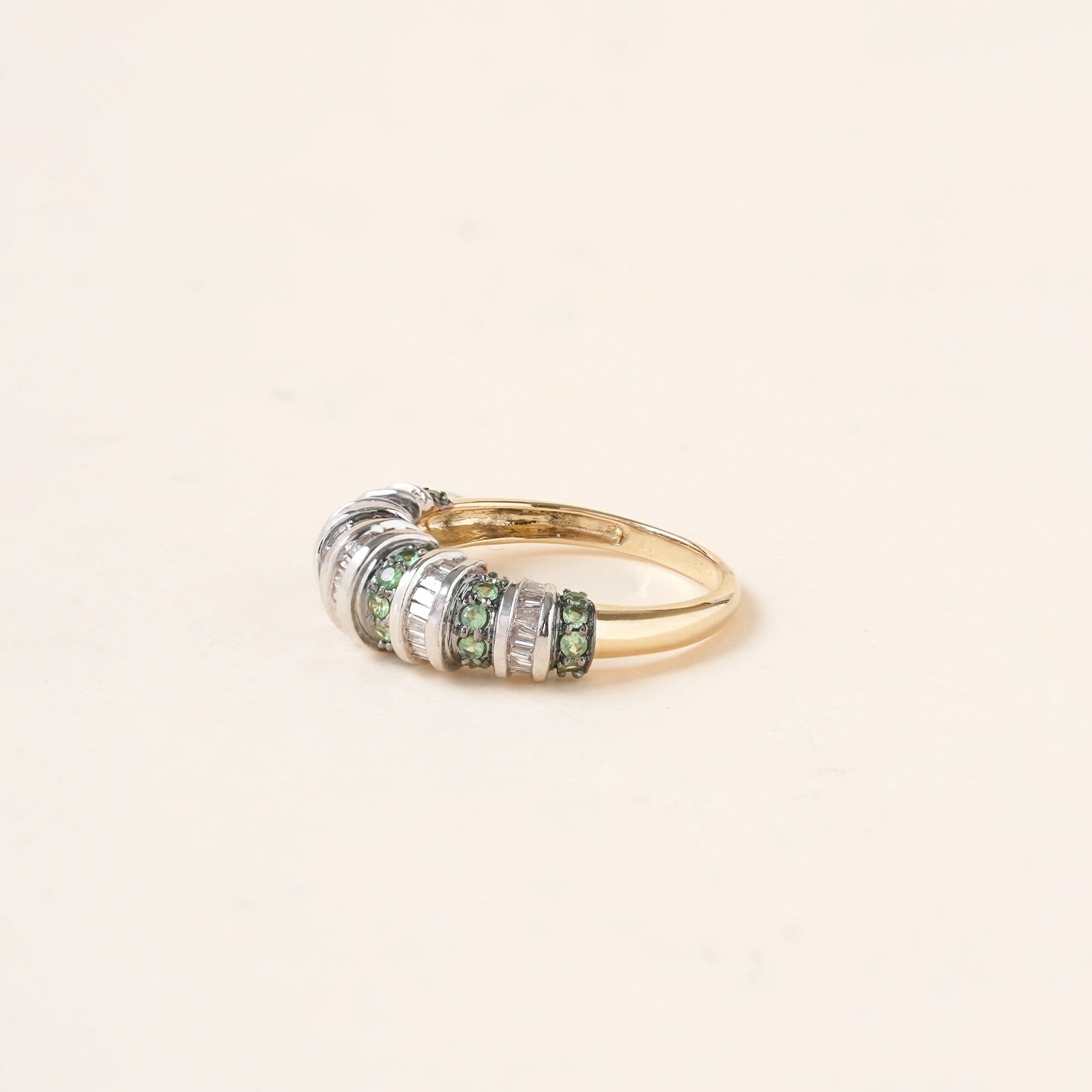 Paris Tsavorite Ring in 14K gold with alternating natural baguette diamonds and tsavorite in an architectural band