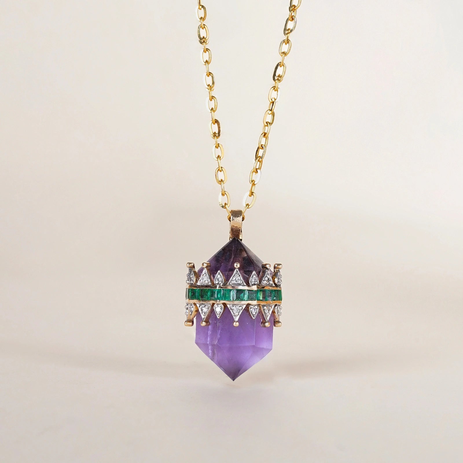 Promise Mini Pendant Necklace in yellow gold with crystal-cut purple amethyst crowned by a diamond and emerald tiara on an omega chain