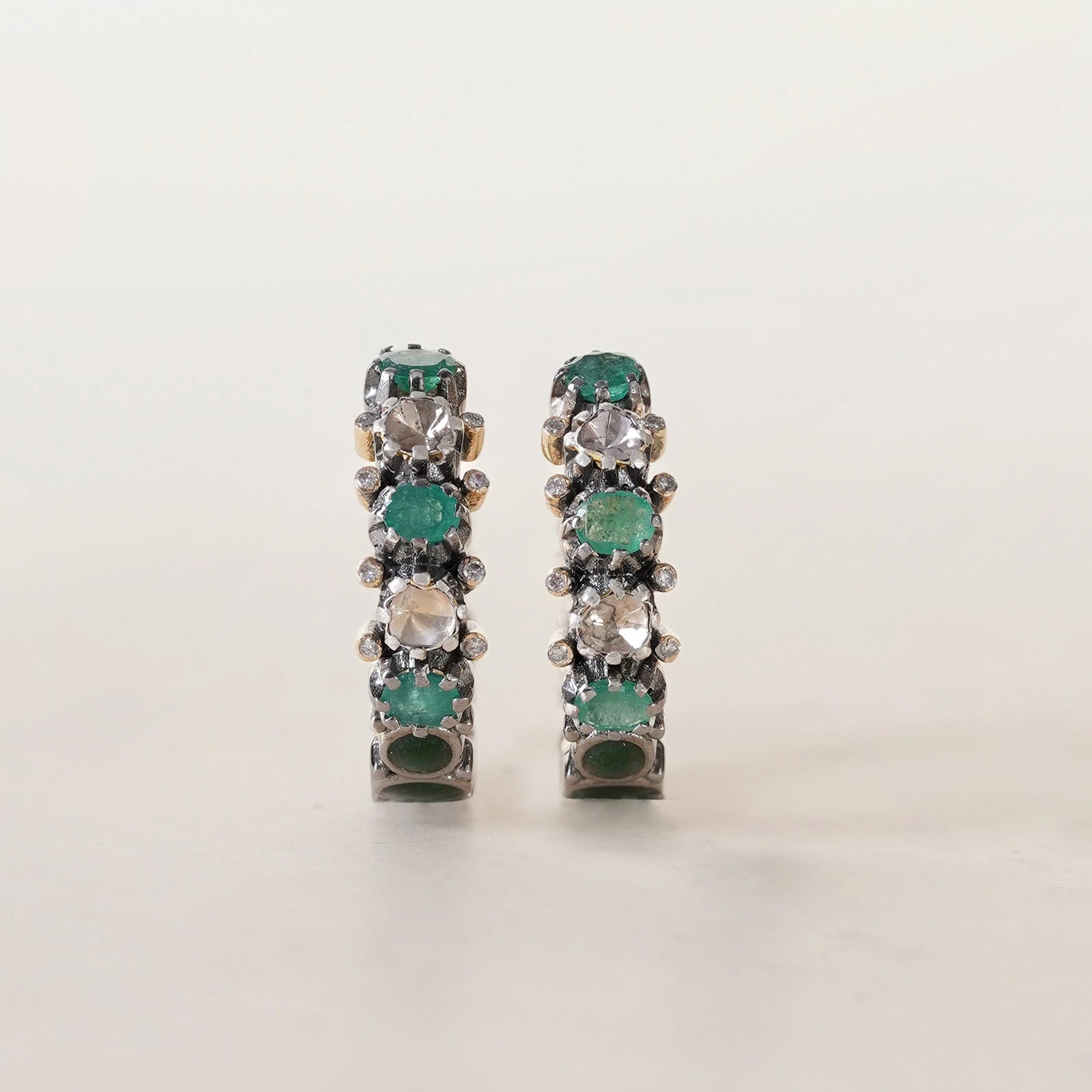 Rumi Emerald Hoop Earrings in gold and 925 silver with emerald and polki in pacchikaam setting, vilandi diamonds, and green enamel detail