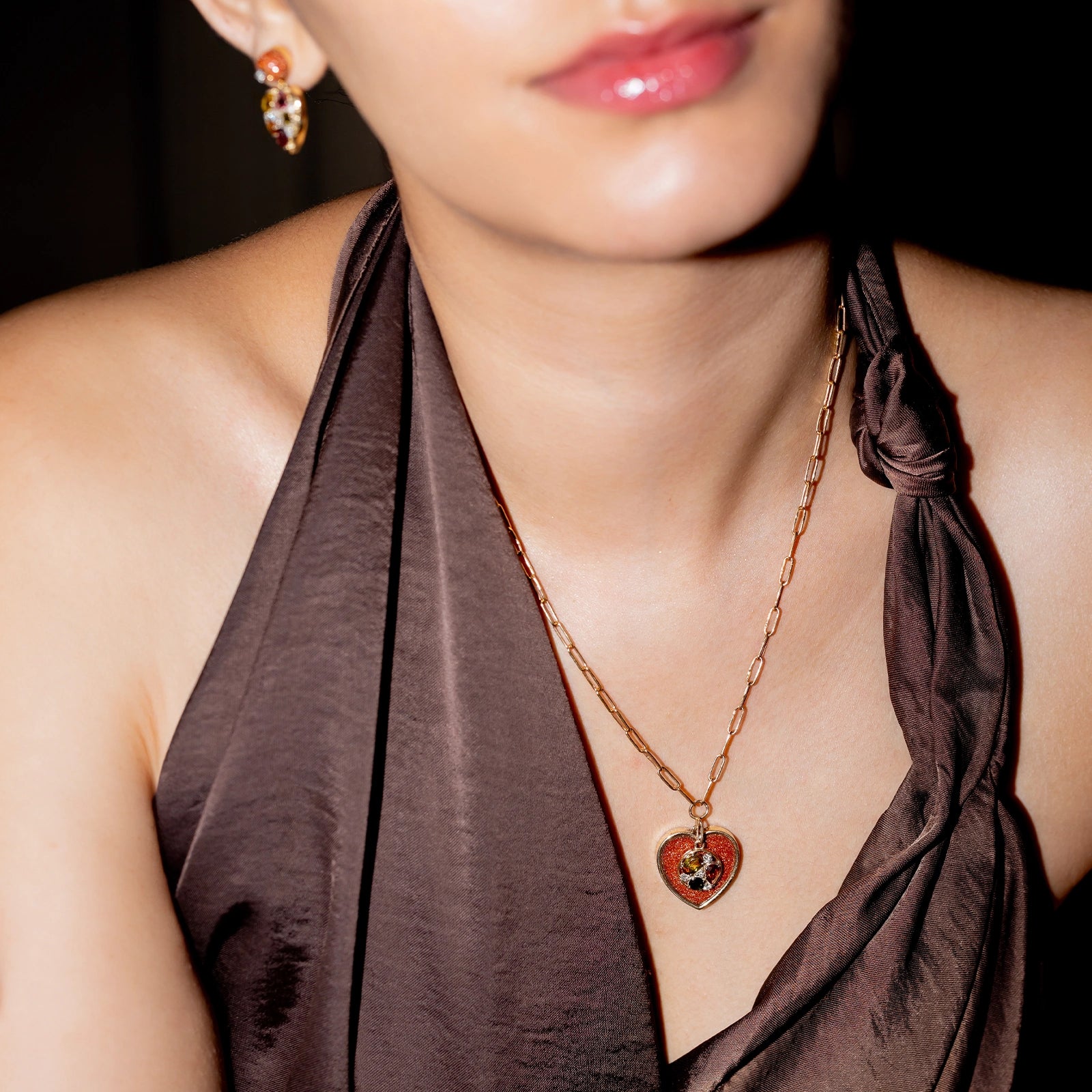 Belov Necklace in 14K gold with heart-shaped sunstone, tourmaline accents and natural diamond detailing.