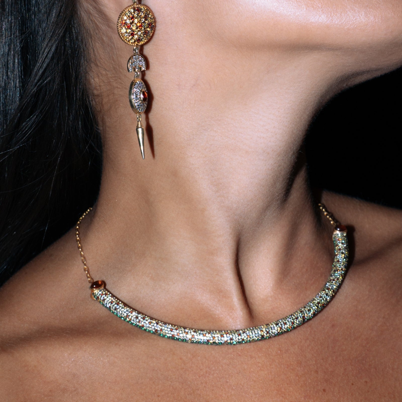 Close-up of yellow and orange sapphires set with seamless micropave shading